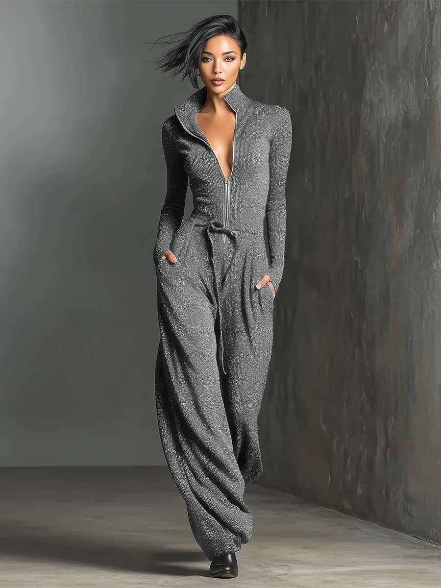 Perla – Mono elegante de punto con brillo y cremallera frontal