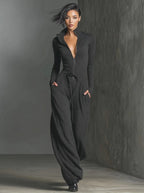 Perla – Mono elegante de punto con brillo y cremallera frontal