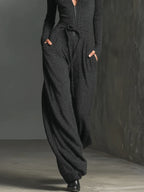 Perla – Mono elegante de punto con brillo y cremallera frontal