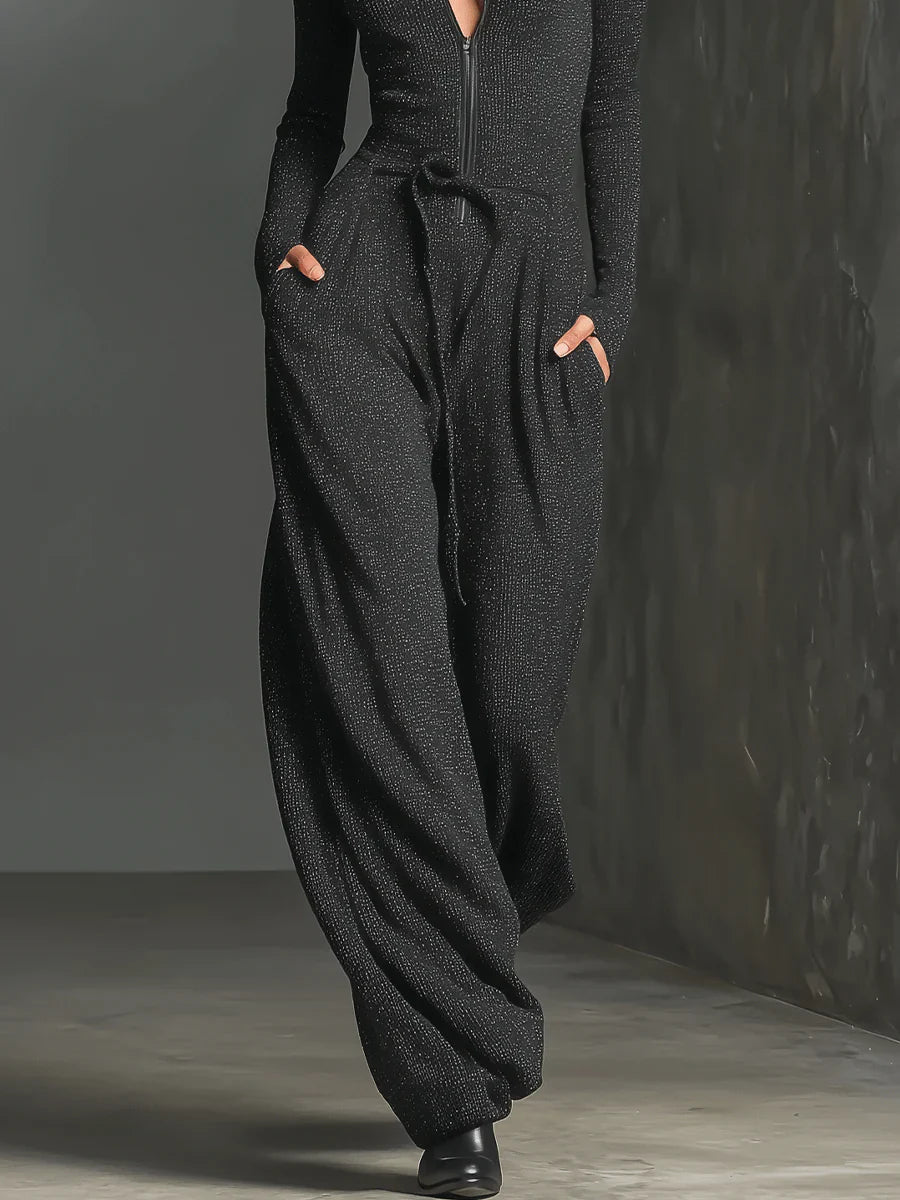 Perla – Mono elegante de punto con brillo y cremallera frontal