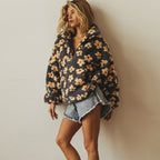 Daisy - Jersey oversize con estampado floral