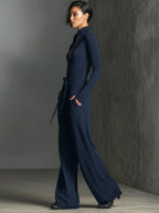 Perla – Mono elegante de punto con brillo y cremallera frontal